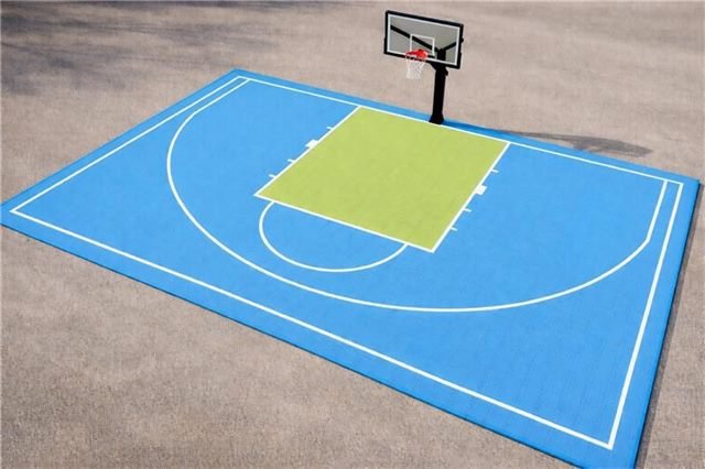 Evolve basketball court 153 m² – thermoplastic tiles, IG-AH-180 stand